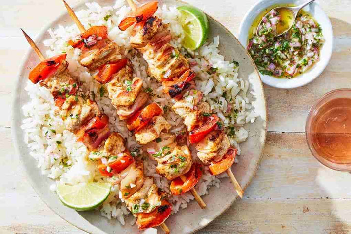Skewered chicken or beef with vegetables and rice recipe